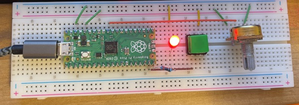 Raspberry Pi Pico with LED, button, and potentiometer